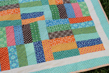 Load image into Gallery viewer, Multicolored Strip Patchwork Quilt