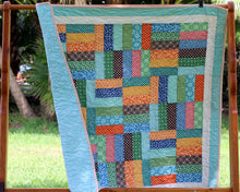 Load image into Gallery viewer, Multicolored Strip Patchwork Quilt
