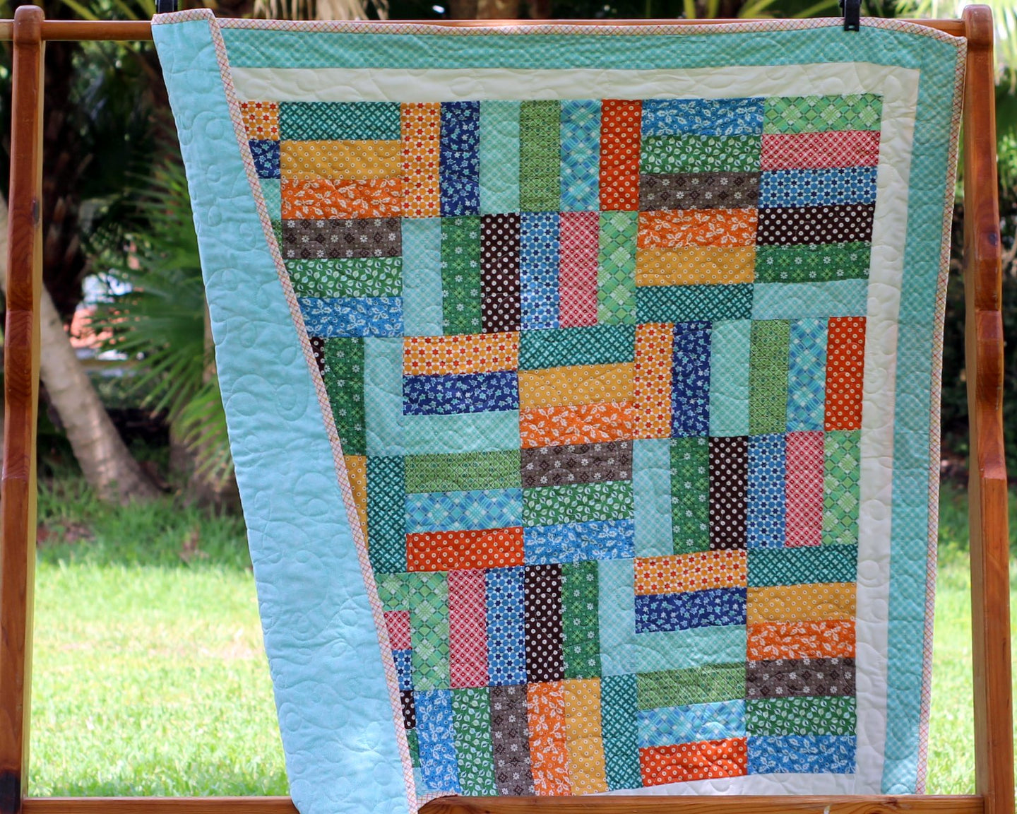 Multicolored Strip Patchwork Quilt