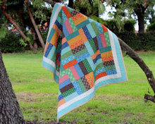 Load image into Gallery viewer, Multicolored Strip Patchwork Quilt
