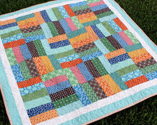 Load image into Gallery viewer, Multicolored Strip Patchwork Quilt
