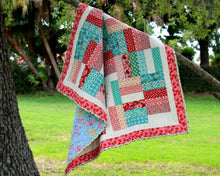 Load image into Gallery viewer, Pink and Blue Strip Patchwork Quilt
